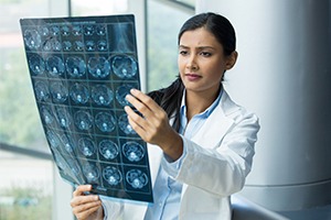 stock-photo-closeup-portrait-of-intellectual-woman-healthcare-personnel-with-white-labcoat-looking-at-full-221866882